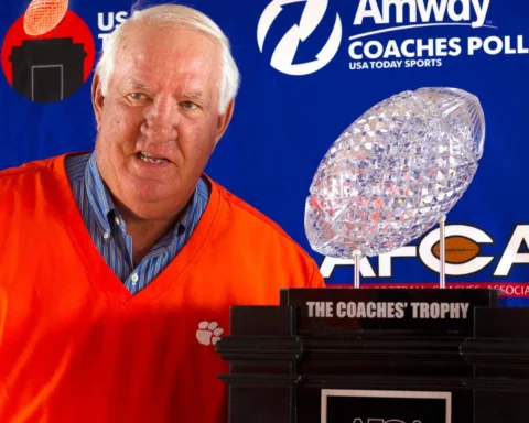 danny ford with coach trophy